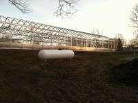 Hoop houses alone failed to meet Judges Farms herb-growing needs.