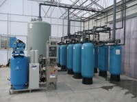 Lucas Greenhousesâ€™ water treatment system includes the grey ozone contact tank, six pre-filters and four posy filters.