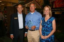 Sam Rambo, center, Operation of the Year finalist, with Greenhouse Grower’s Robin Siktberg and BASF’s Steve Larson