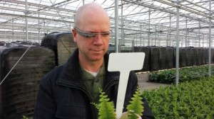 Michael Camplin, GGS Sales Manager, scanning a potted plant’s tag with Google Glass at Hendriks Greenhouses