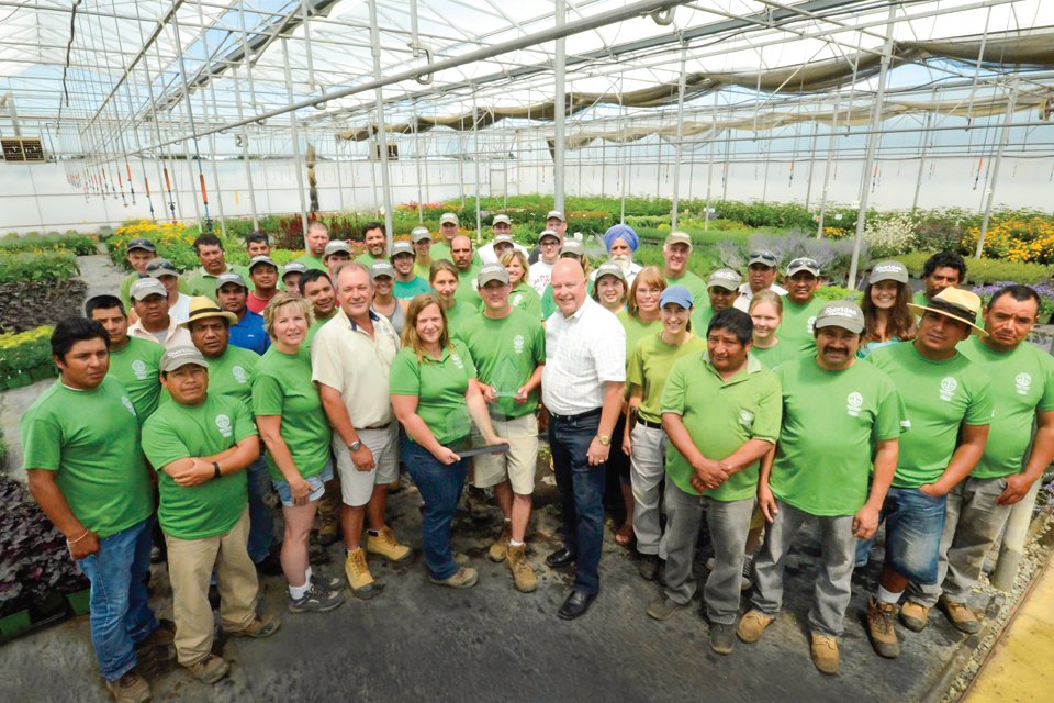 Sheridan Nurseries CEO Karl Stensson (center) presents the growing team at the operation’s Norval, Ontario facility with its Grower of the Year awards