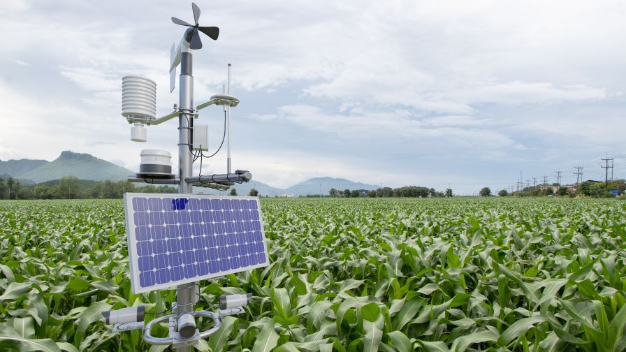 Agriculture smart precision farming IoT (Internet of Things) weather station with solar panel, sensors, and 5G technology.