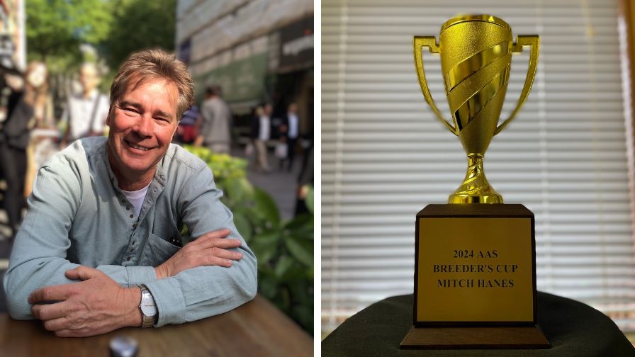 All-America Selections (AAS) Breeders' Cup Award winner Mitch Hanes (L) and his trophy (R)