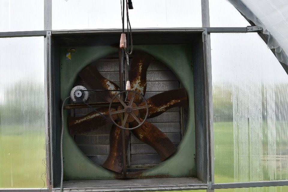 Installation of a new exhaust fan belt.