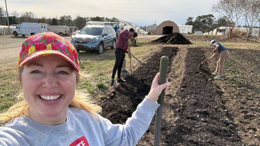 Horticulture graduate students Amanda Solliday, Moein Moosavi and Emma Coogan prepare the cut flower sustainability planting beds for the sustainable Red and White Garden.