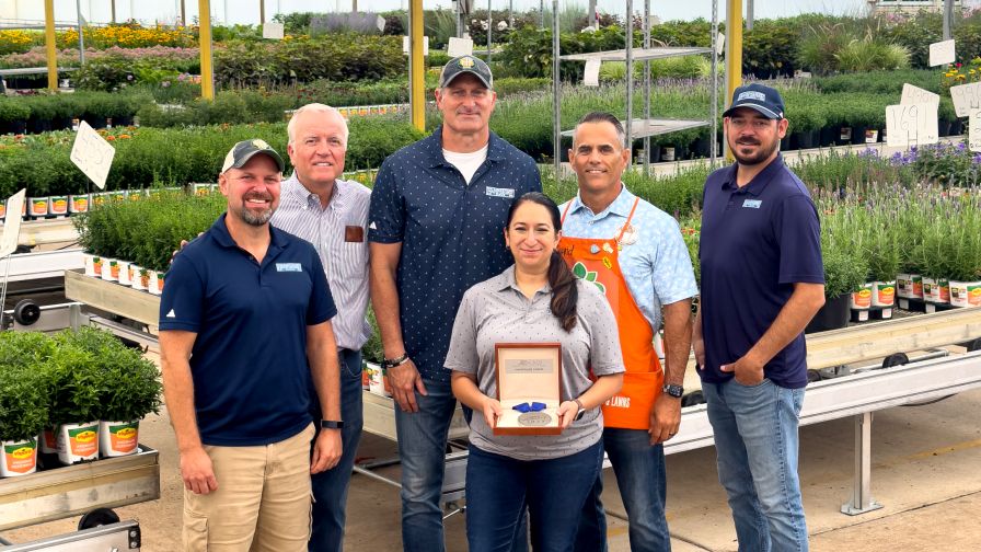 Pictured, from left: Matt Fredrickson, Director of Production Operations; Fred Wacker, President; Bob Whiteside, Vice President of Sales and Merchandising; David Graham, Senior Live Goods Merchant at the Home Depot; Travis Hudson, Director of Merchandising; Susan Castellanos, Director of Sales for House Plants, at Hampshire Farms.