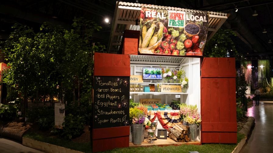 The "Peter Henderson to Present: The Horticulturists of the Garden State" exhibit from Mercer County Community College, the winner of the PHS Philadelphia Flower Show Cup for Best in Show — Educational Exhibits.